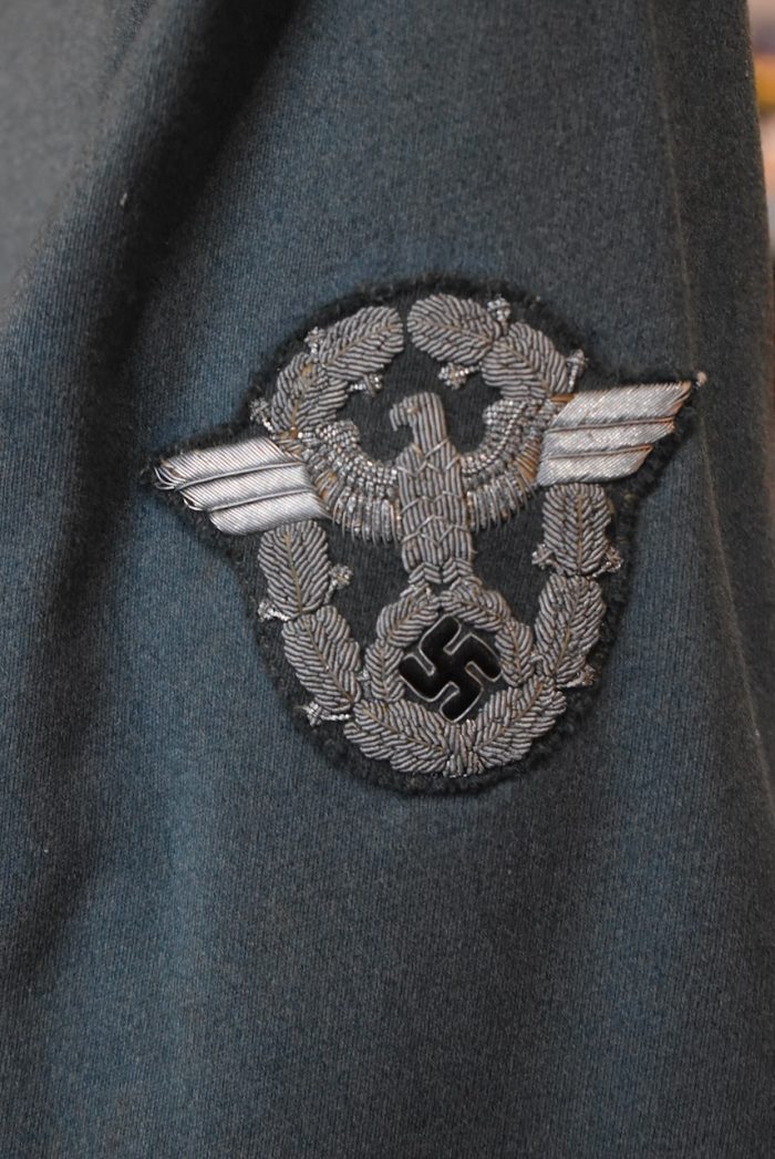 Starožitná uniforma italského legionáře označená na poutku firmou krejčího J. Fiala ML. Nymburk
