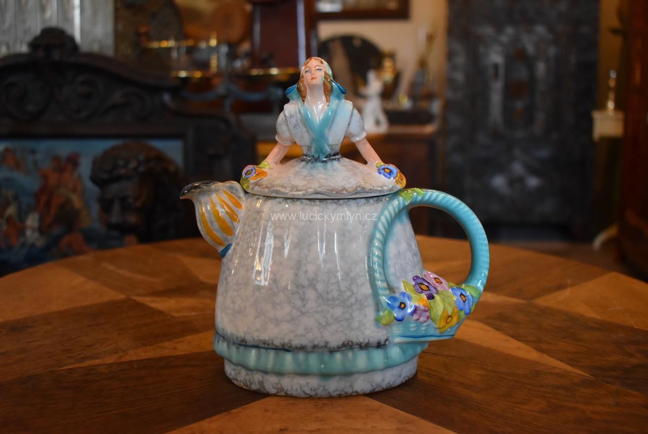 Okouzlující starožitná konvička Okouzlující starožitná konvička