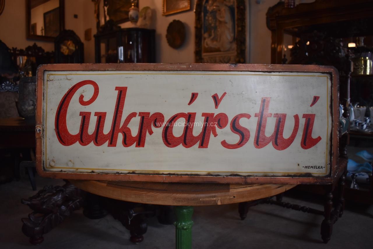 Starožitná prvorepubliková cedule CUKRÁŘSTVÍ Starožitná prvorepubliková cedule CUKRÁŘSTVÍ