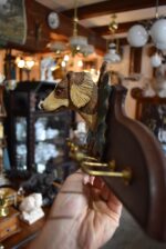 Starožitný věšáček s hlavičkou loveckého psa