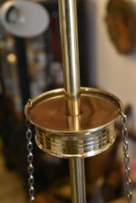 Delší starožitné atypicky navržené secesní dvouramenné světlo