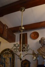 Delší starožitné atypicky navržené secesní dvouramenné světlo