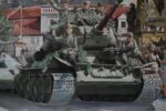 Monumentální obraz osvobození Poděbrad v roce 1945 – sovětské tanky, vítající dav a vzdávající se němečtí vojáci, malíř Mikšovský