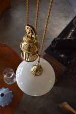 Větší atypicky ztvárněná starožitná stahovačka se třemi rameny