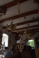 Větší atypicky ztvárněná starožitná stahovačka se třemi rameny