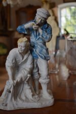 Porcelánová soška Rybáři od Royal Dux z první poloviny 20. století
