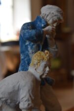 Porcelánová soška Rybáři od Royal Dux z první poloviny 20. století