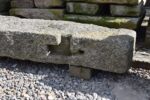 Velký historický ručně sekaný žulový plotový sloupek se staletou patinou.