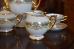 Porcelánový kávový servis Limoges pro 6 osob s zlatým dekorem ze závěru 19. století.