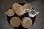 Starožitný porcelánový servis O.&E.G. Royal Austria s květinovým dekorem pro 4 osoby.