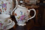 Starožitný porcelánový servis O.&E.G. Royal Austria s květinovým dekorem pro 4 osoby.