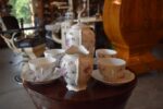 Starožitný porcelánový servis O.&E.G. Royal Austria s květinovým dekorem pro 4 osoby.