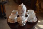 Starožitný porcelánový servis O.&E.G. Royal Austria s květinovým dekorem pro 4 osoby.