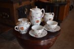 Starožitný porcelánový servis O.&E.G. Royal Austria s květinovým dekorem pro 4 osoby.
