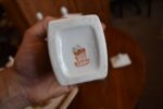 Starožitná porcelánová kořenková souprava s hodinami Gebrüder Benedikt Dvory.