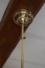 Starožitný lustr ART-DECO ze zlatě leštěné mosazi s opálovým stupňovitě profilovaným stínidlem.