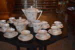 Starožitný porcelánový kávový servis ART-DECO pro 10 osob s květinovým dekorem a zlatou linkou.