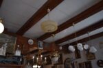 Starožitný rondokubistický lustr ART-DECO s medovým skleněným stínidlem ve tvaru UFO.