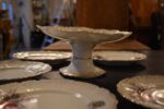 Starožitná porcelánová dezertní souprava PULS Ostrov s růžemi a monogramem.