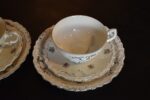 Starožitné porcelánové šálky s podšálky Franz Manka Stará Role, pár.